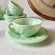 Pressed glass cups and saucers, 1950s