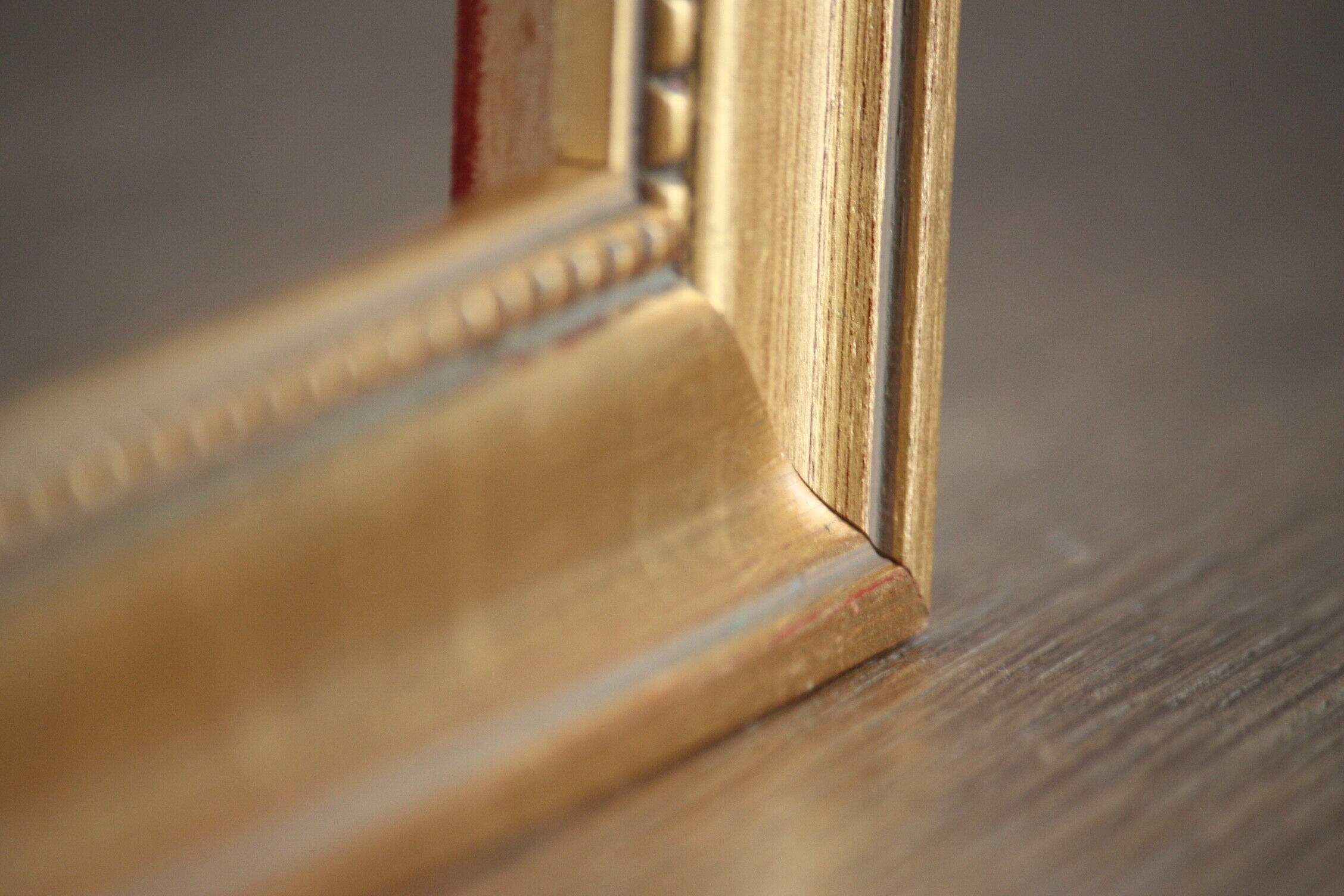Carved and moulded gilded wood frame