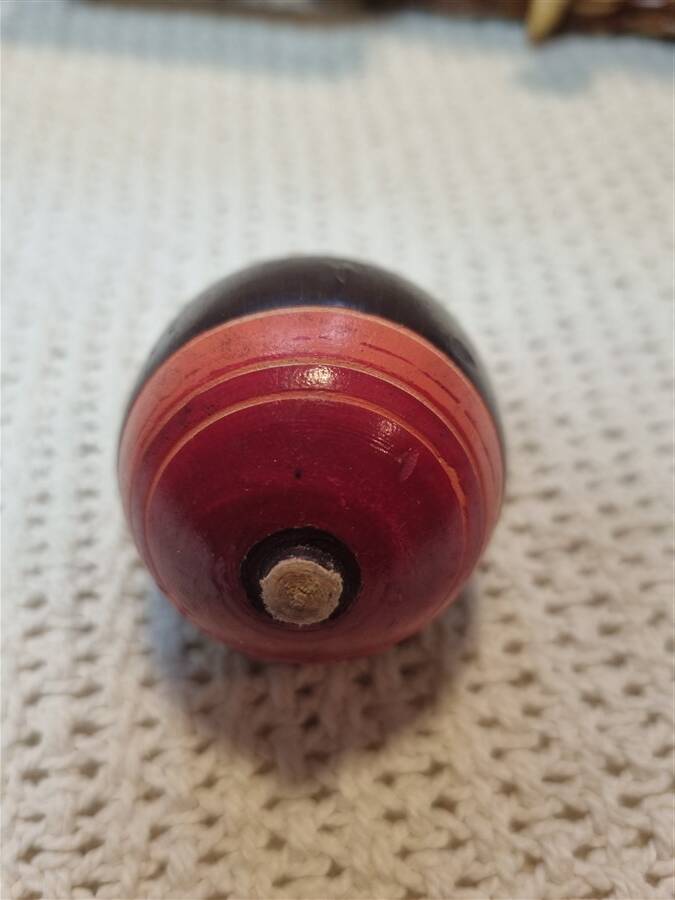 Duo of old spinning tops