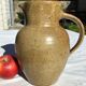 Beige handcrafted speckled sandstone pitcher