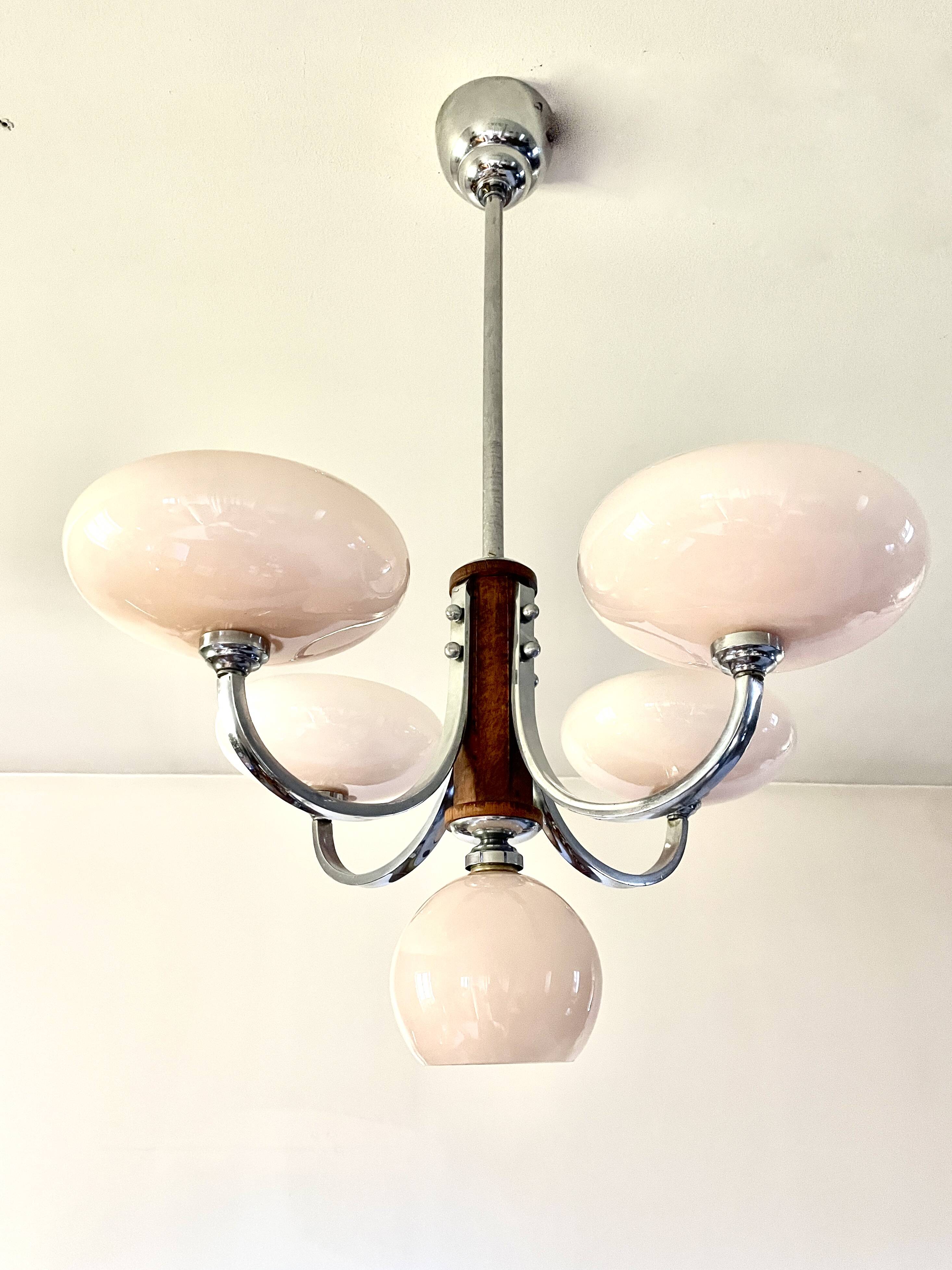 Art Deco lustre with pink glass, wood, and chrome from the 1930s.