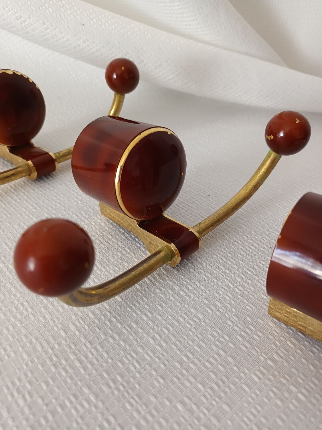 Art deco bakelite brass hooks