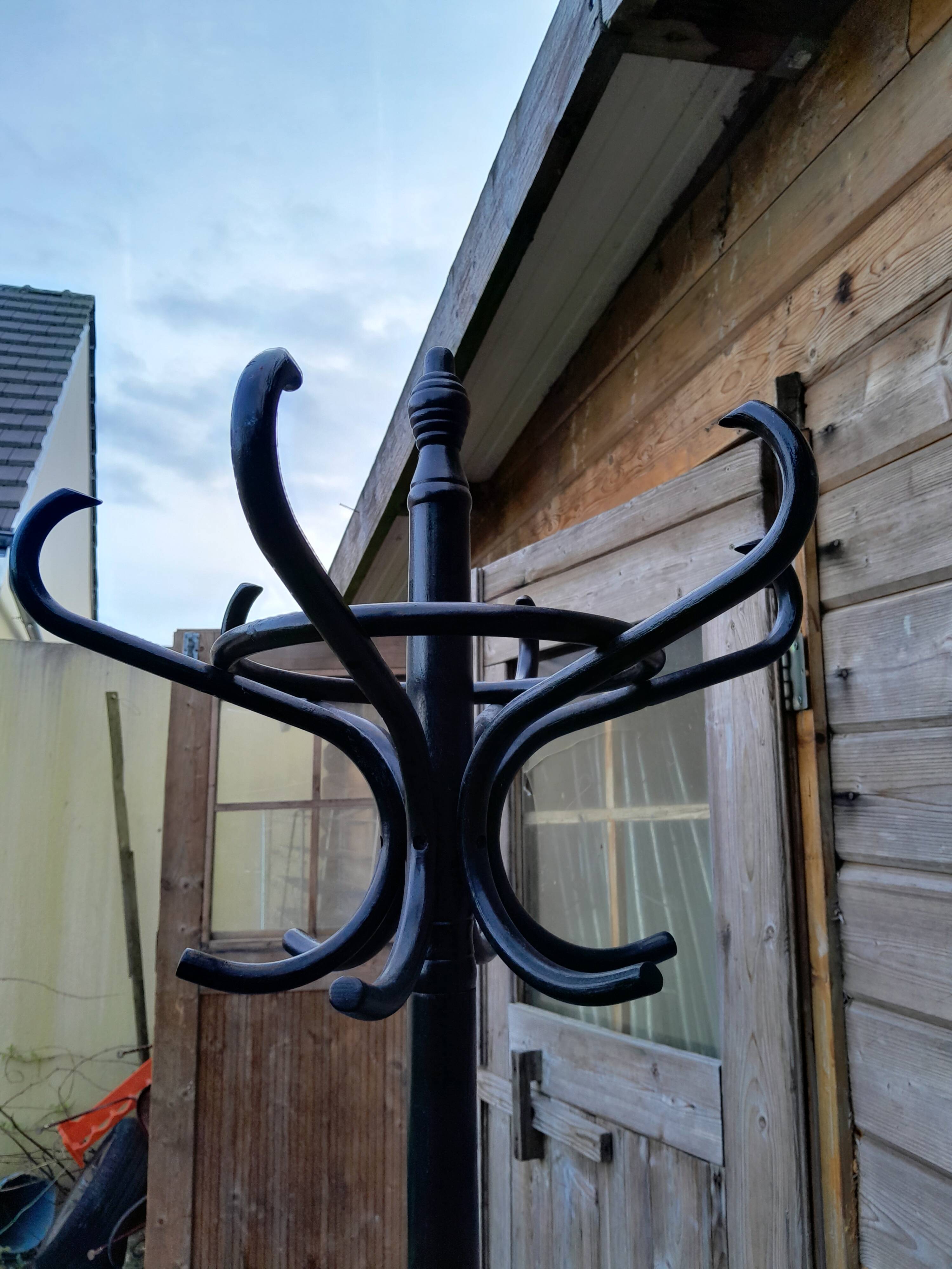 Vintage parrot coat rack in old wood