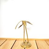 Brass heron head down