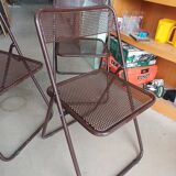 vintage perforated metal folding chair –