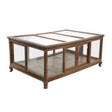 Wooden display case on legs