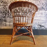 Vintage children's armchair in wicker