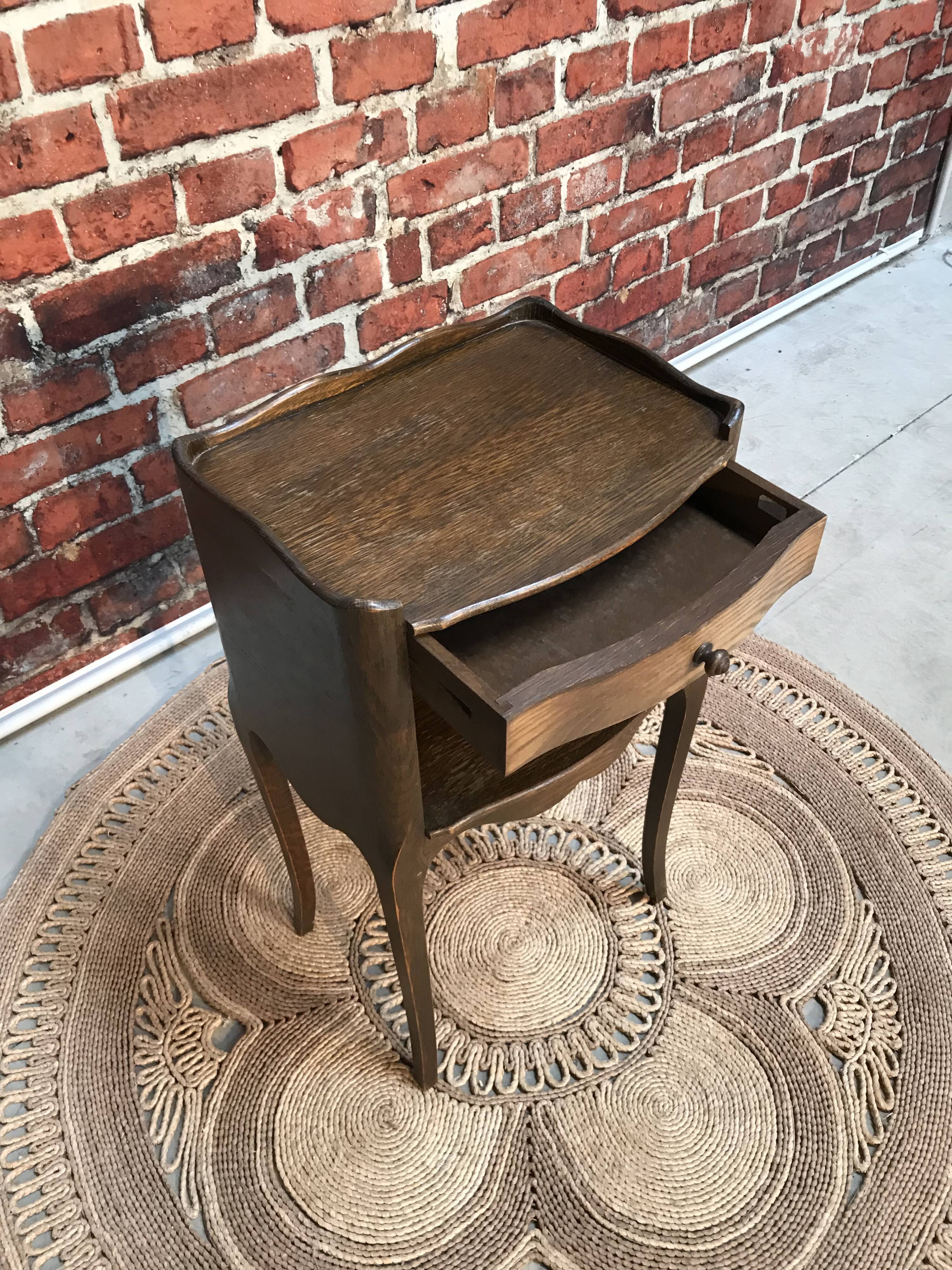Classic dark wood bedside table