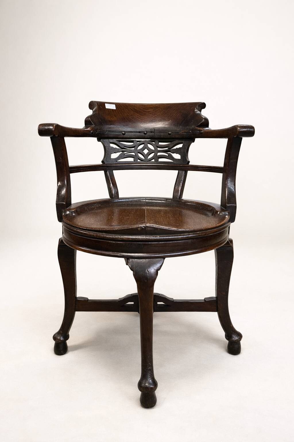Edwardian swivel office chair in mahogany, 360° rotation.