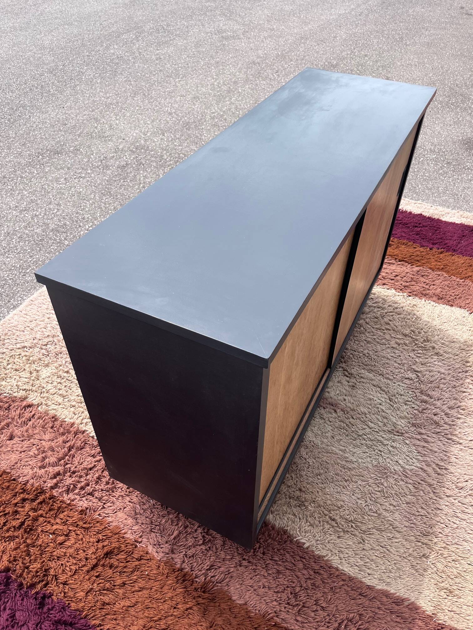 black and wood two-door sideboard