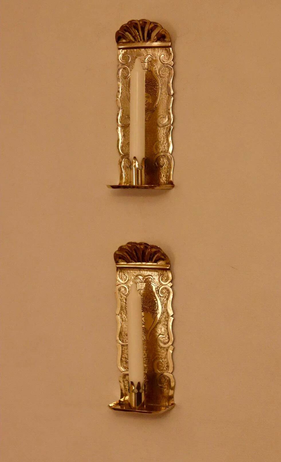 A pair of Swedish brass wall sconces from the mid-century.