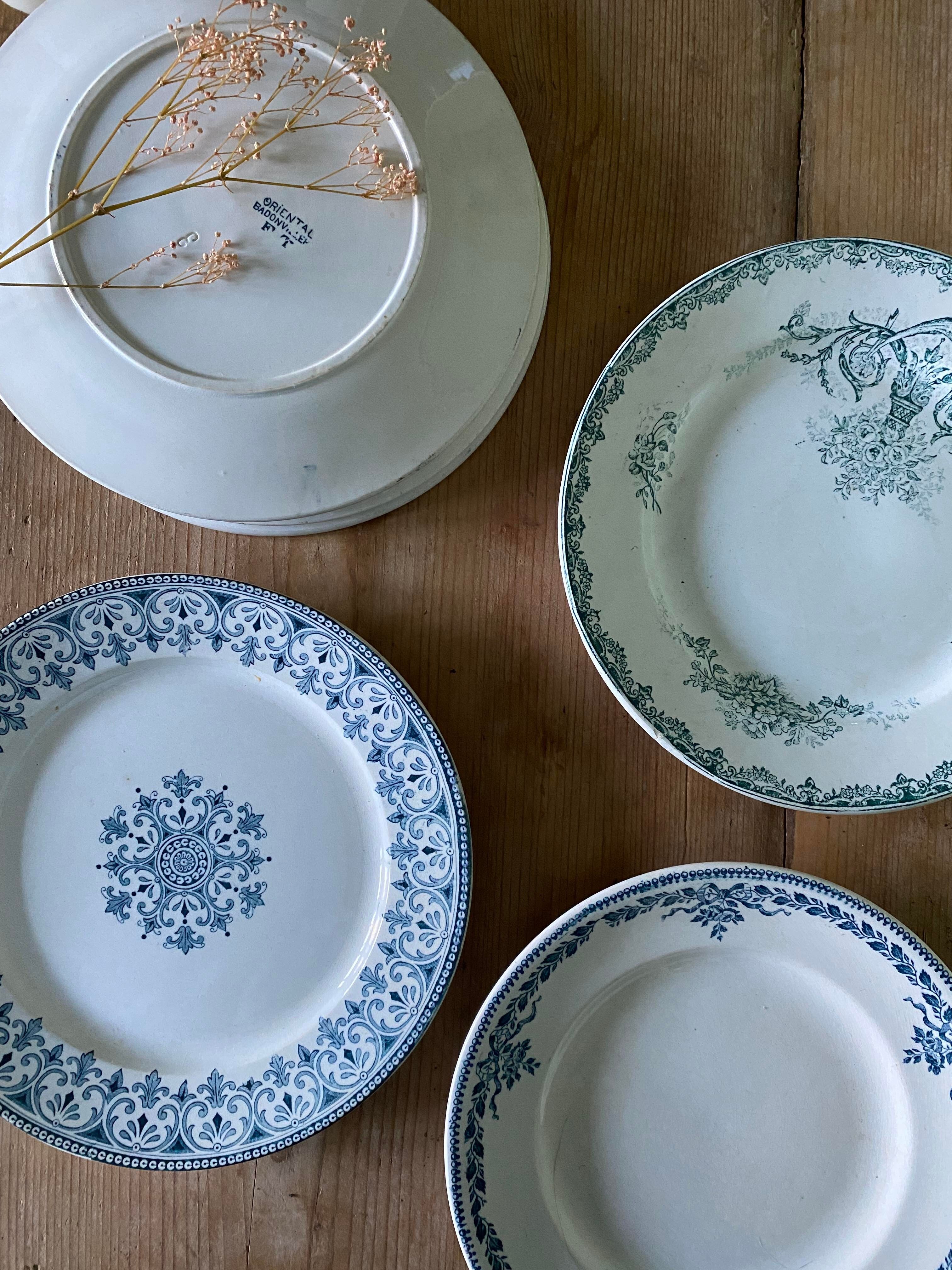 Set of 6 old flat plates in mismatched iron earth