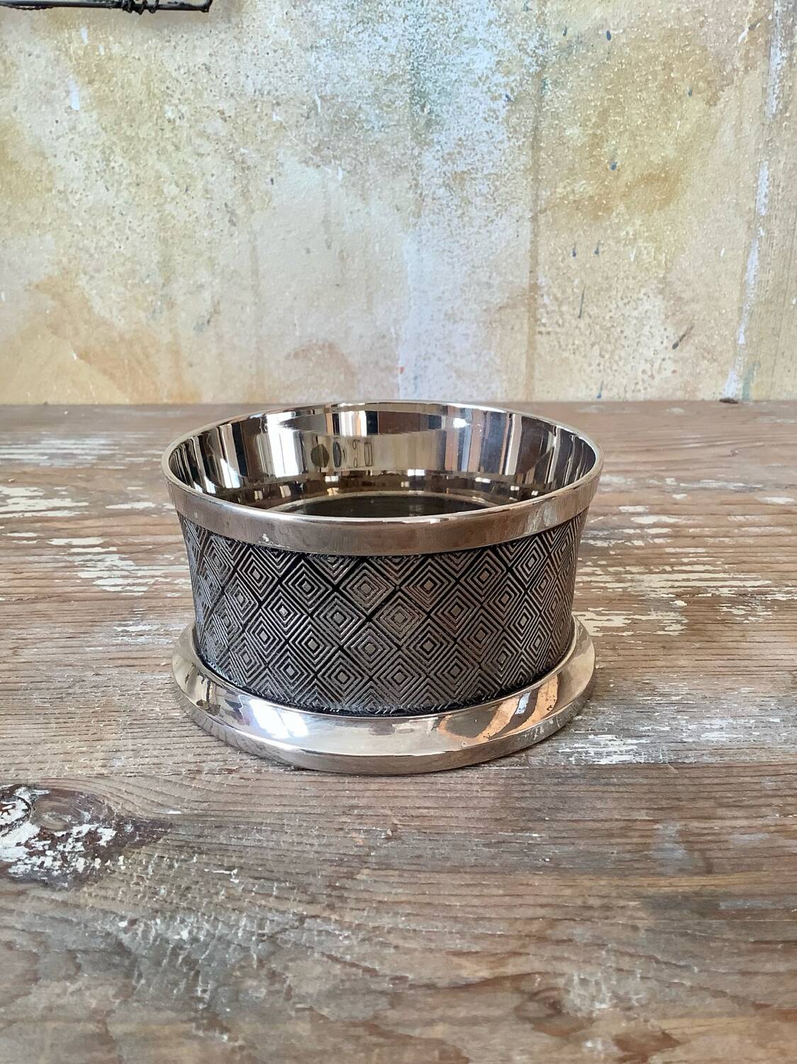 Silver metal bottle coaster