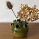 Green ceramic flower pick (Monogram MM)