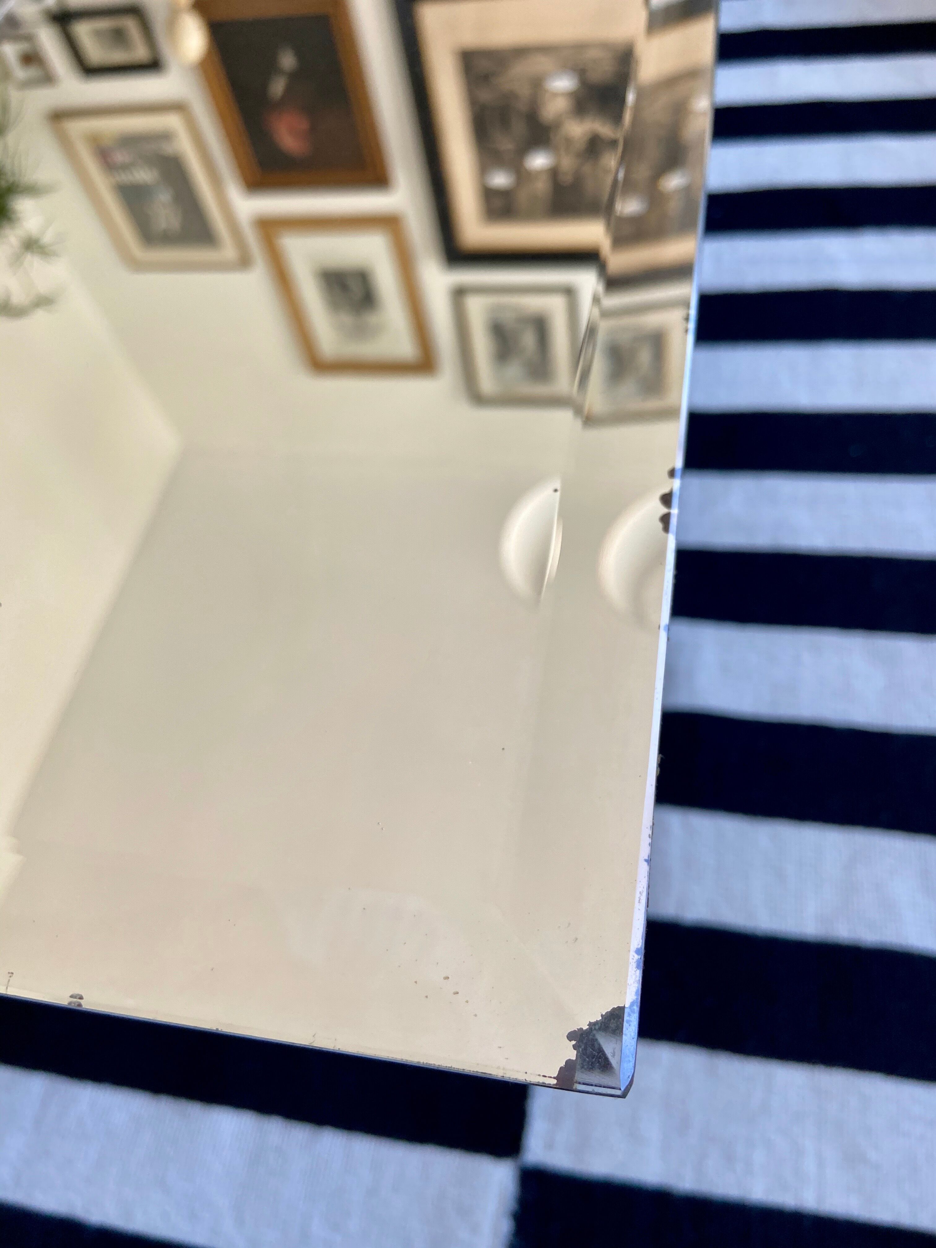 Bevelled mirror 63 x 100 cm