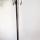 Large art deco floor lamp in wrought iron and white pressed molded glass (height 211 cm)