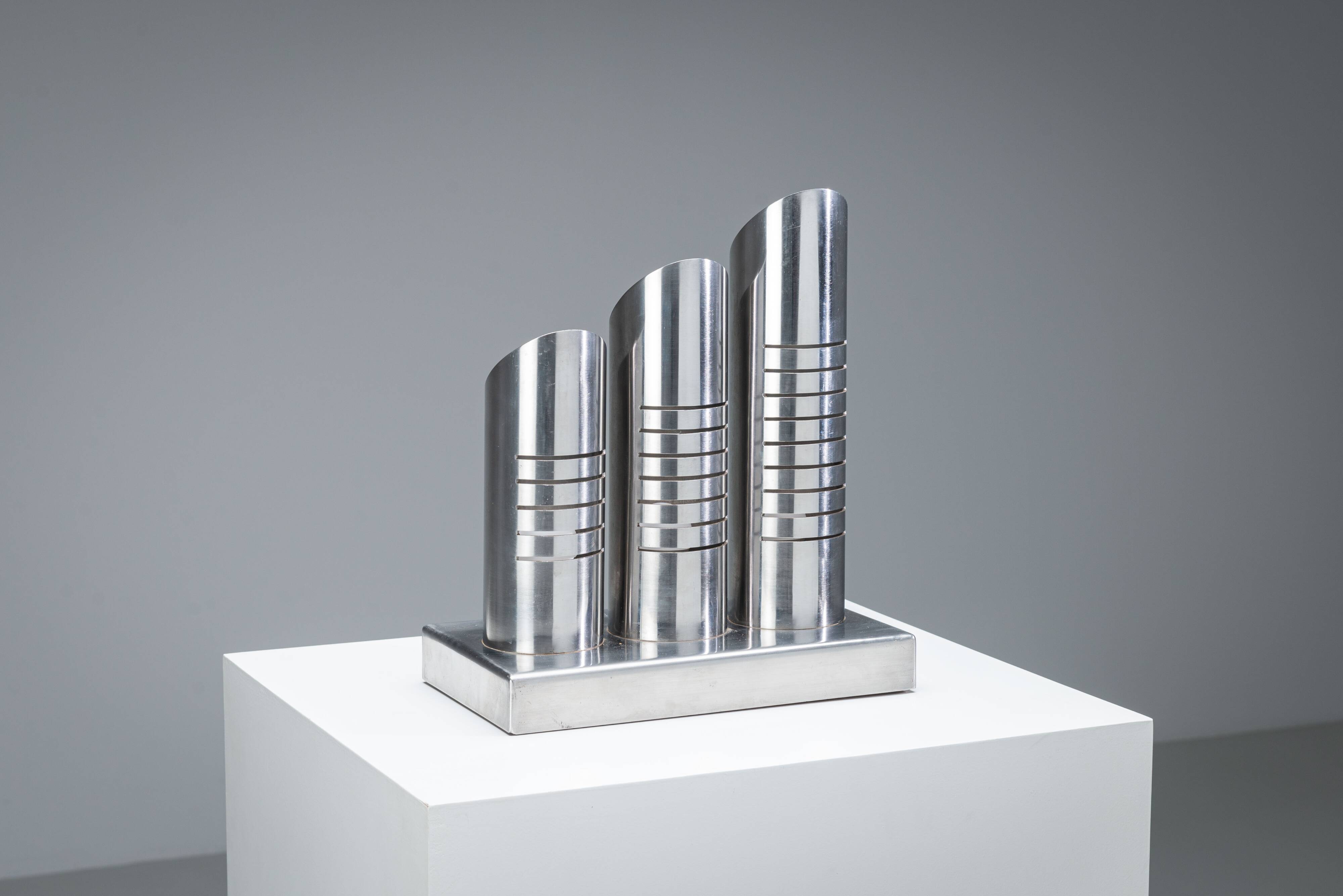 Triple column table lamp in stainless steel by Goffredo Reggiani