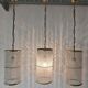 Set of 3 cylindrical crystal chandeliers in mid-century modern style attributed to Lobmeyr.