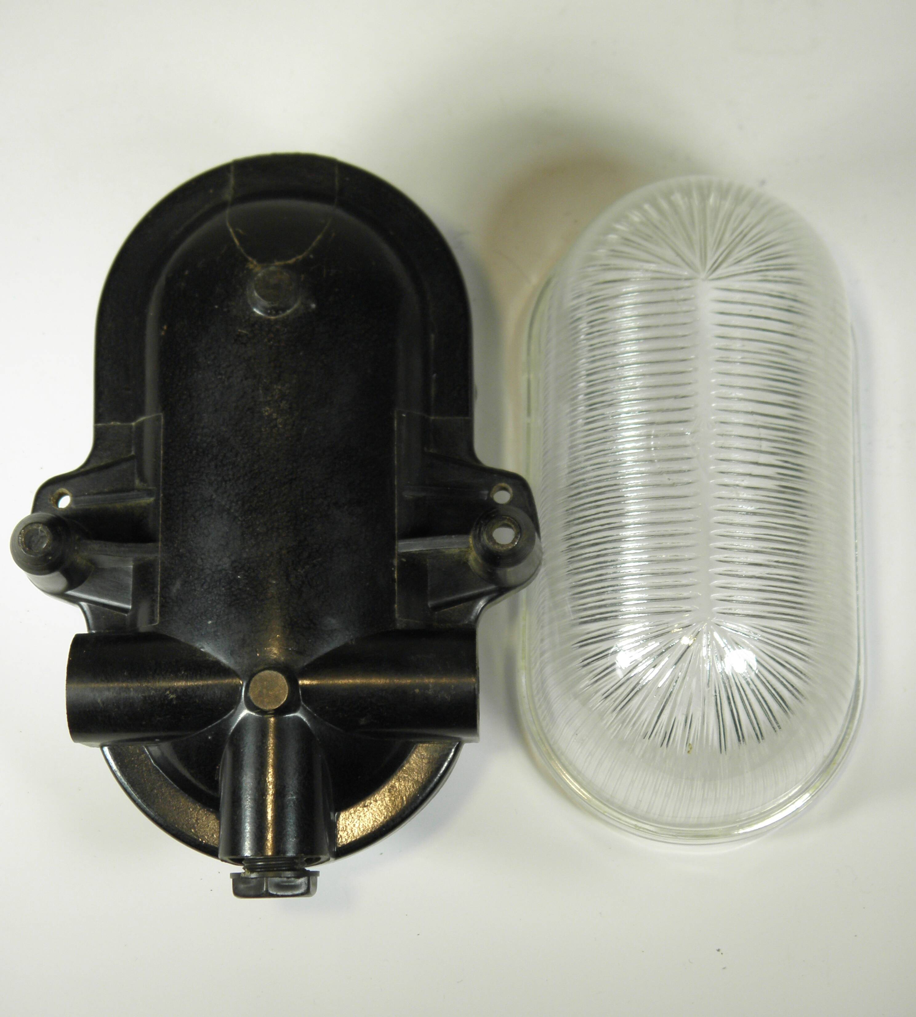 Glass and Bakelite wall light from the 1950s.
