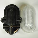 Glass and Bakelite wall light from the 1950s.