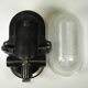 Glass and Bakelite wall light from the 1950s.