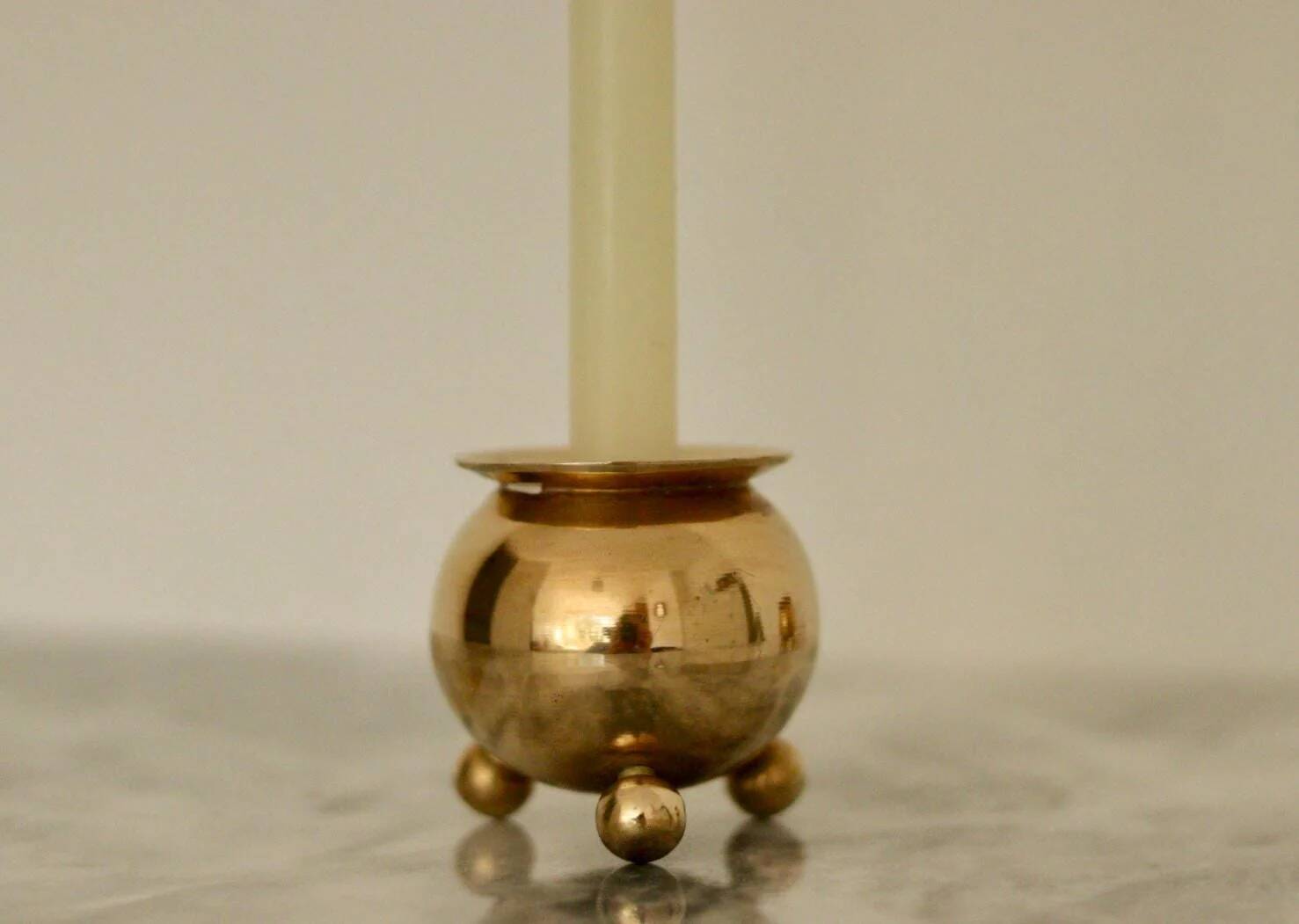 Pair of mid-century Swedish brass candle holders