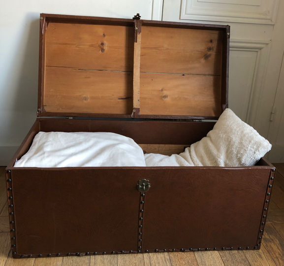 Ancient wooden and faux leather trunk