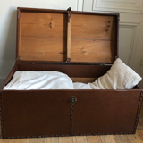 Ancient wooden and faux leather trunk