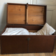 Ancient wooden and faux leather trunk
