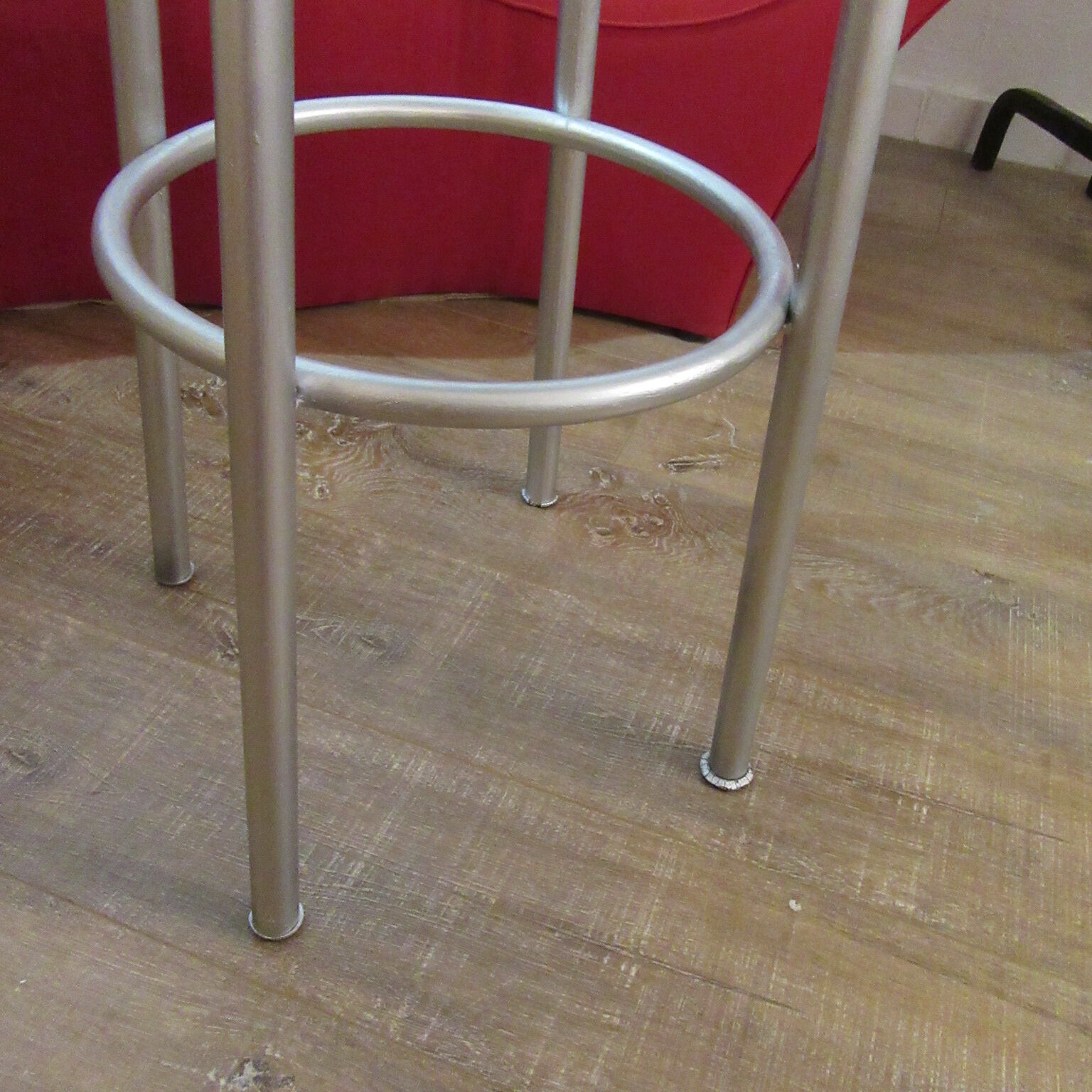 Iron bar stool and black skai seat