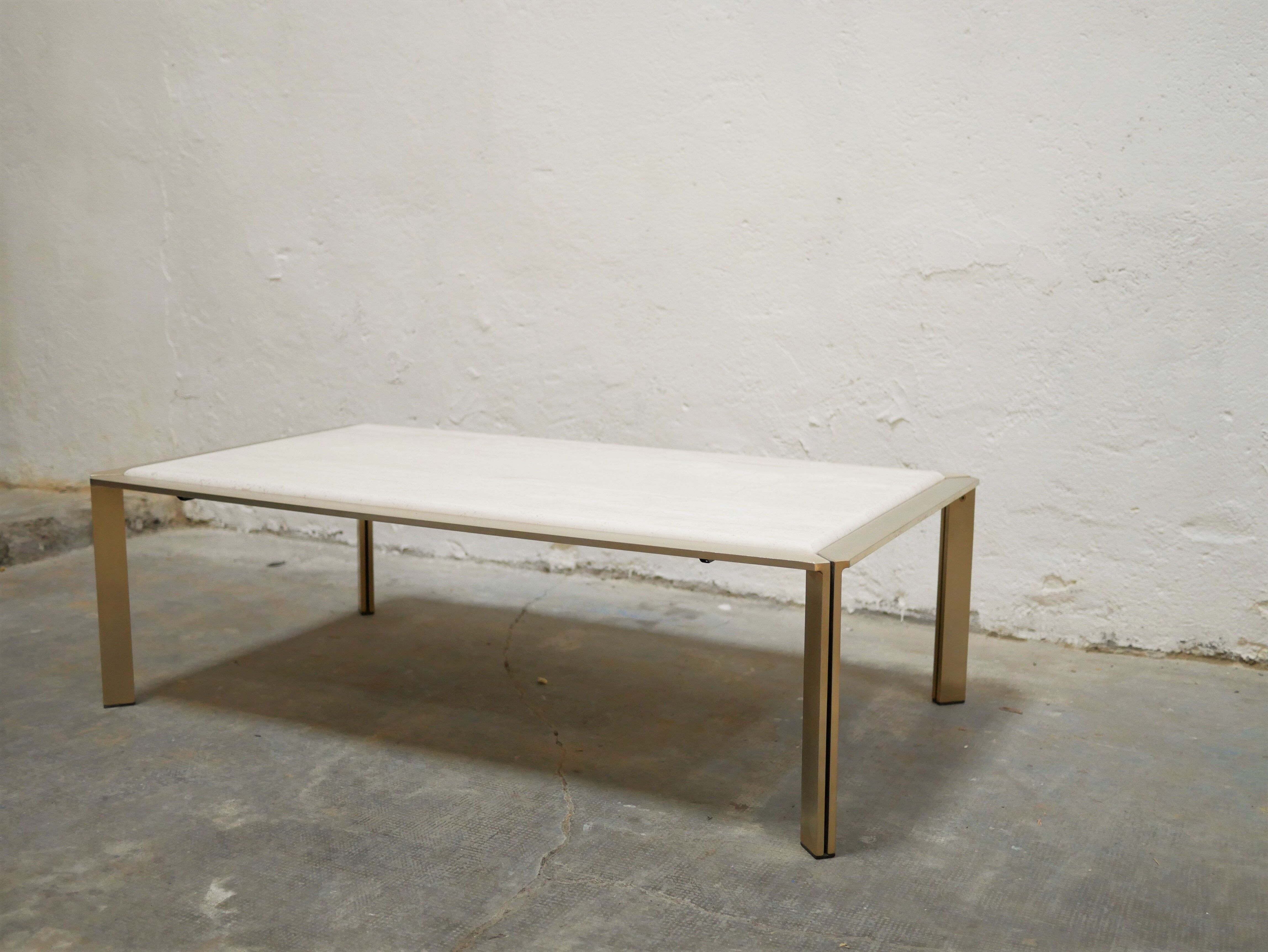 Vintage coffee table in travertine and brass