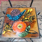 Wrought iron chair with enamelled plate signed Vallauris