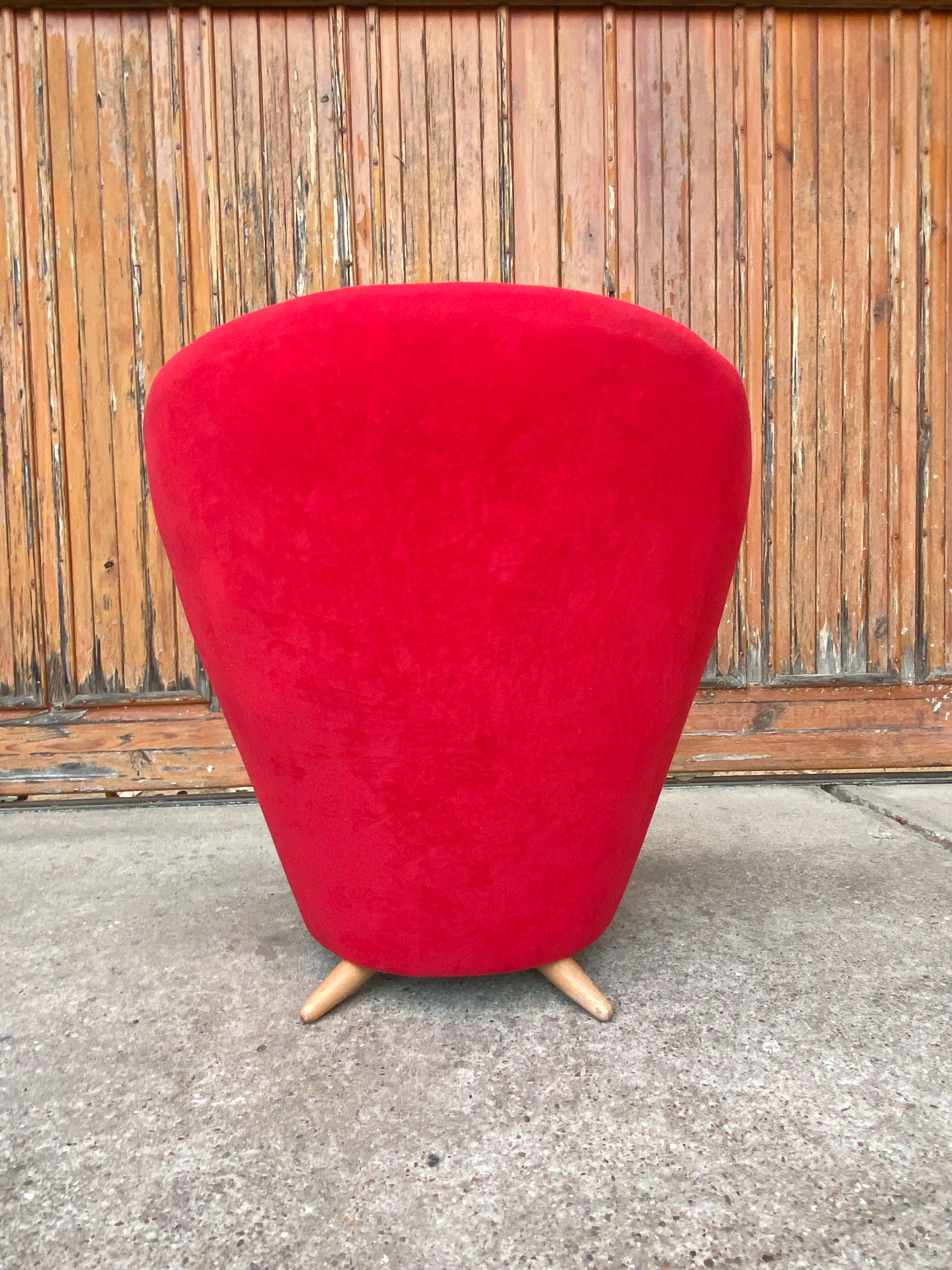 Mid-century red armchair with special legs