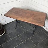 Table de bistrot pieds en fonte dessus en bois massif