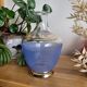 Decanter in blue granite glass and golden borders