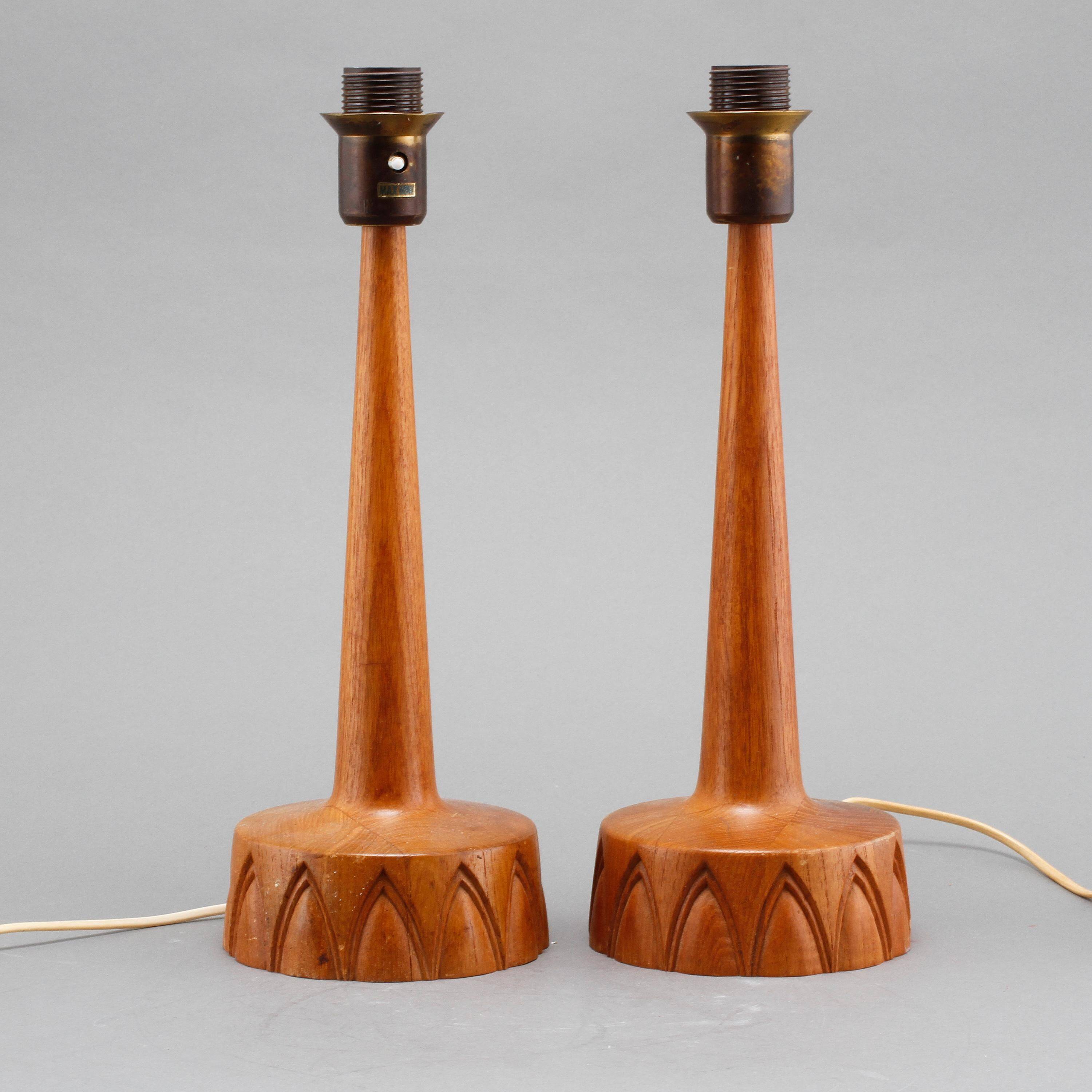 Sculpted teak table lamps for Ab Stilarmatur Tranas, Sweden, 1960.