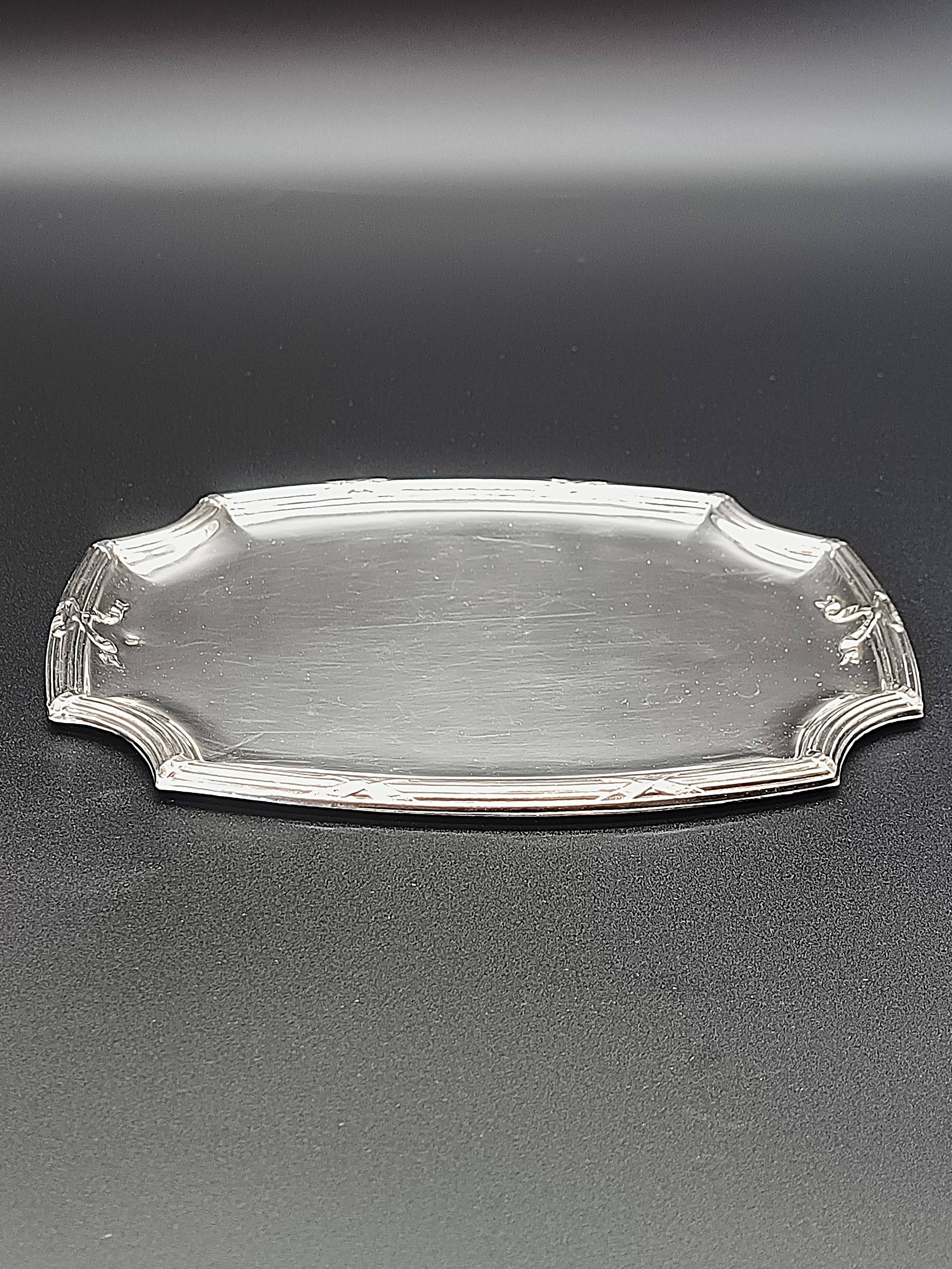 Refined small serving tray or rectangular catch-all with rounded corners.