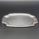 Refined small serving tray or rectangular catch-all with rounded corners.