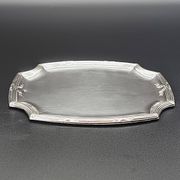Refined small serving tray or rectangular catch-all with rounded corners.
