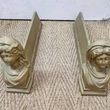 Cast iron andirons heads of women