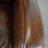 Sheep leather armchair with round shapes