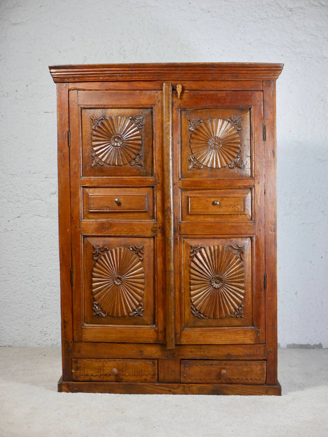Antique carved wooden cabinet