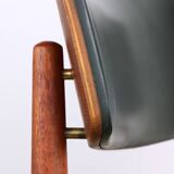Set of 8 Danish chairs in teak, black leatherette and brass, Sven Chrobat/Sax.