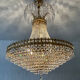 Chandelier cascade of tassels and brass