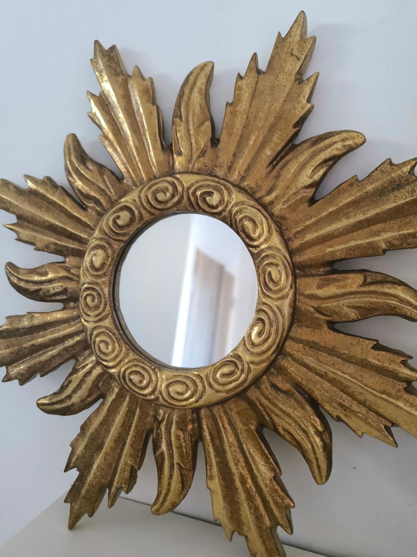 Miroir soleil doré