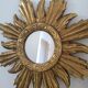 Miroir soleil doré