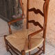 Paire fauteuils paillés