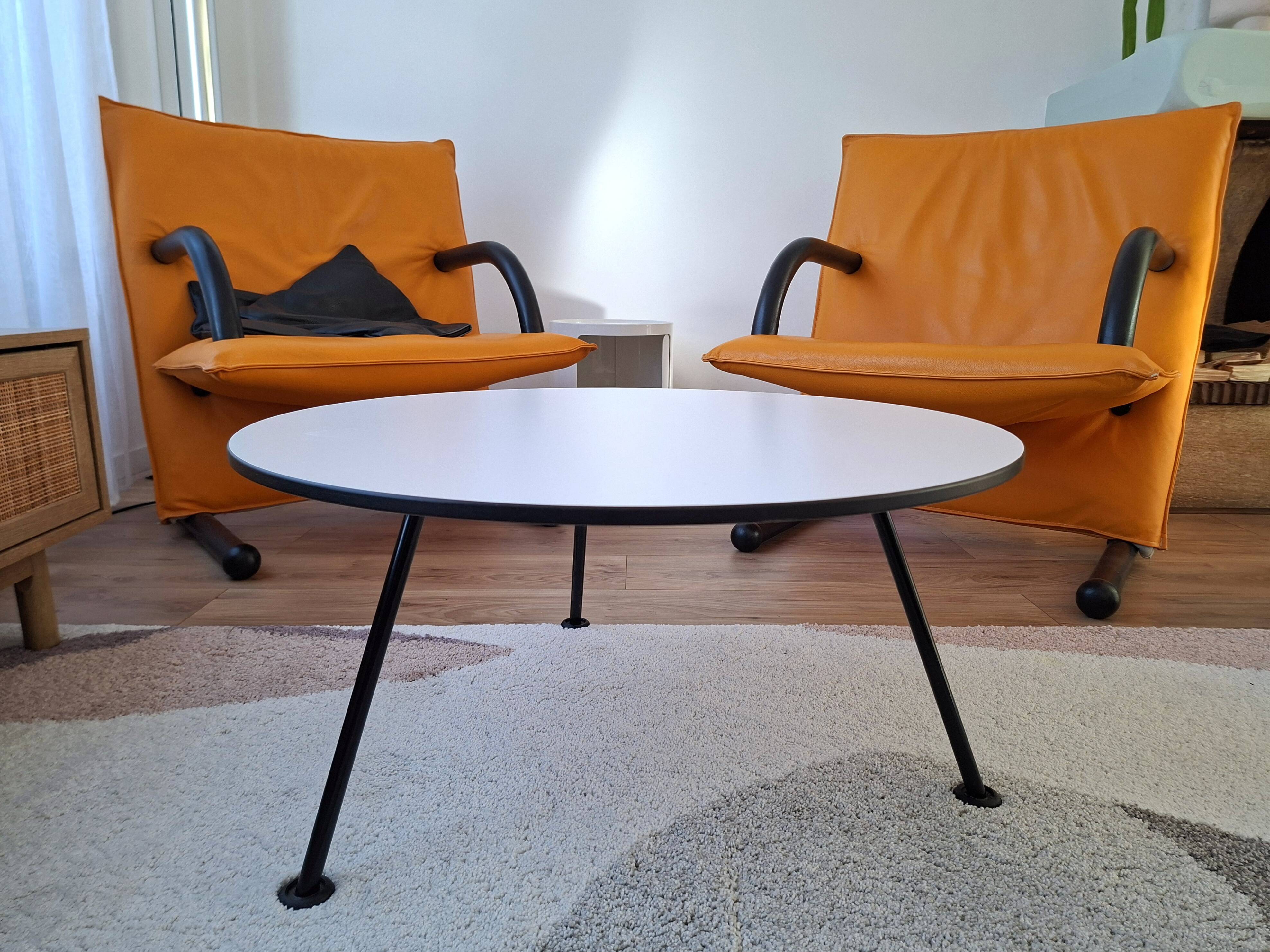 Table with orange slice by Paulin Artifort.