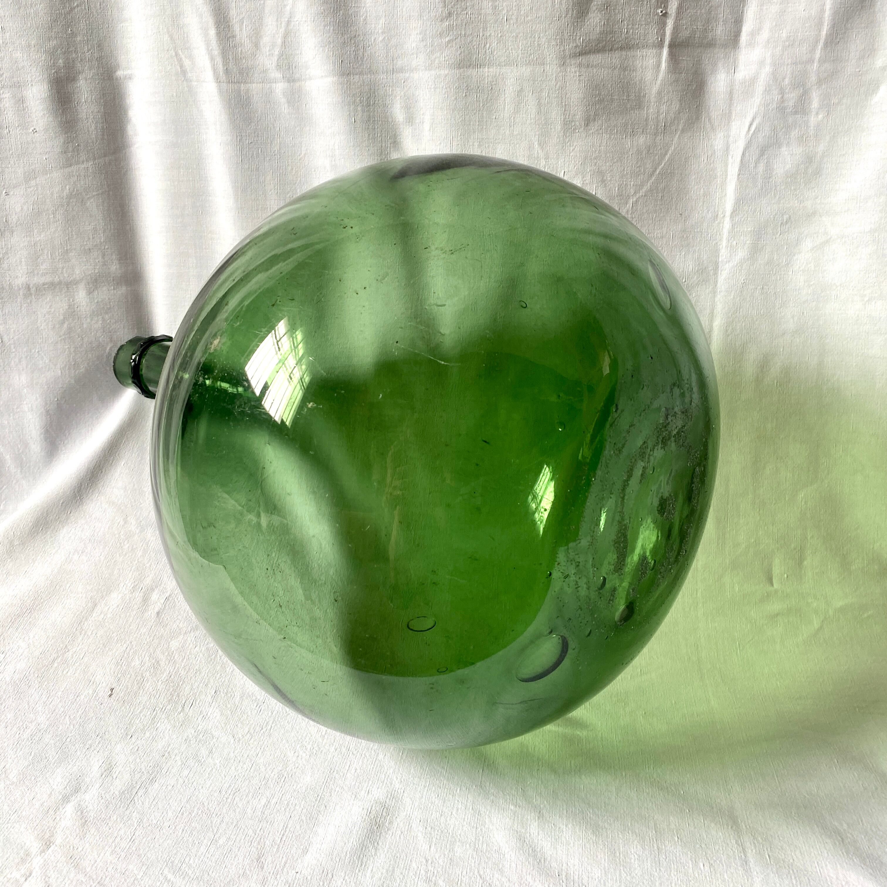 Old Lady Joan in green glass