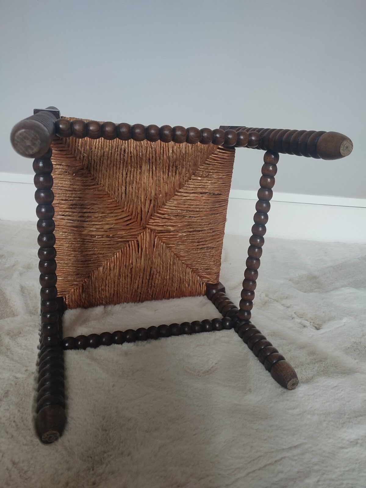 Turned wooden corner chair